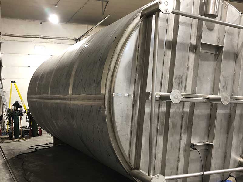 Biron Construction showing steel foot on tank