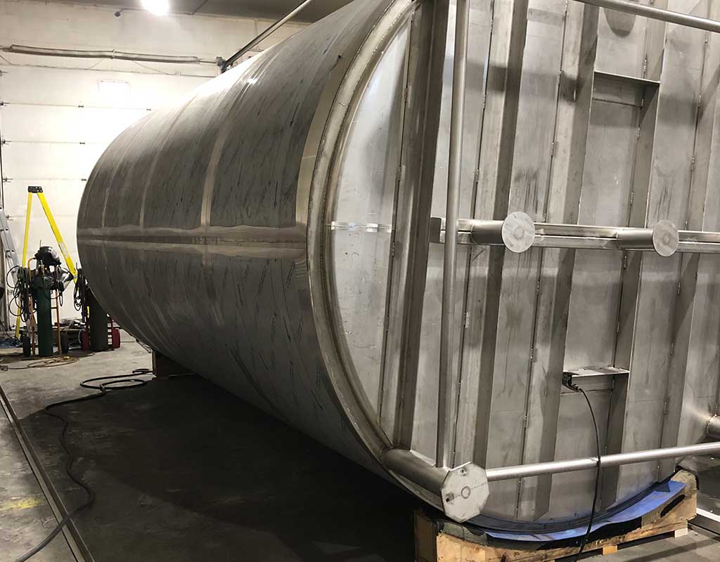 Biron Construction showing steel foot on tank